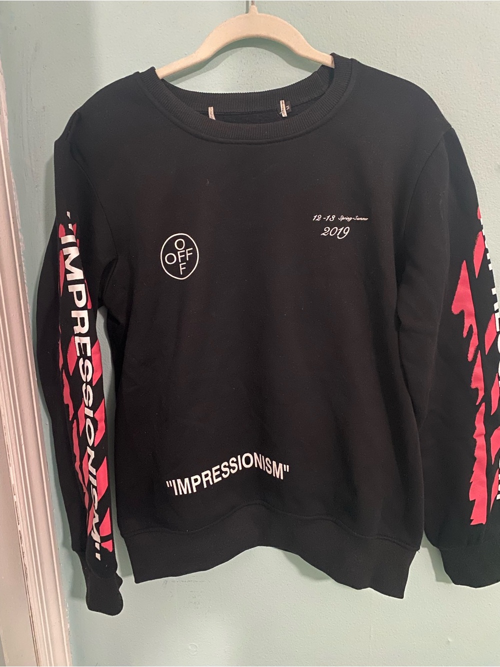 Inspired by Black Crewneck Sweatshirt with red Sleeve Graphics